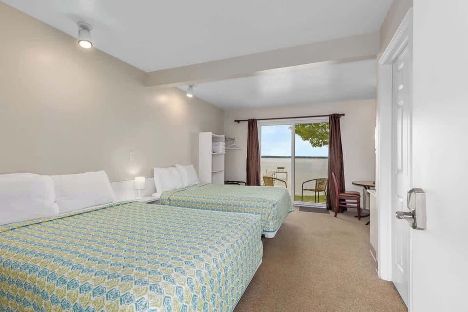 Ground level. Two double beds with a walk out slider. 