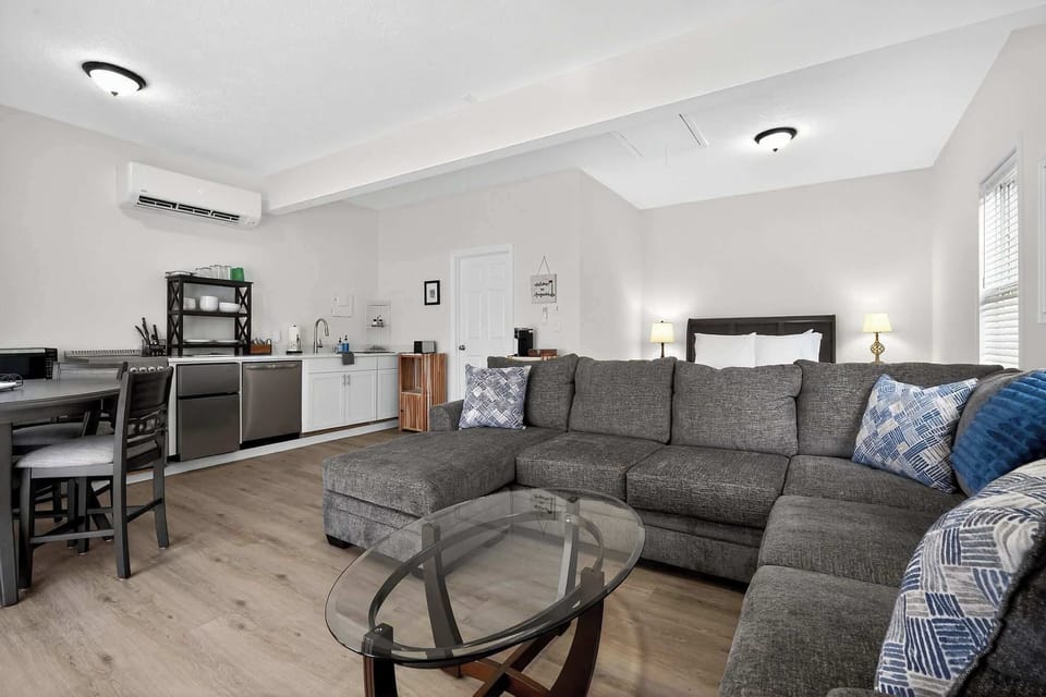 Spacious living room with a large sectional, perfect for lounging and movie nights!