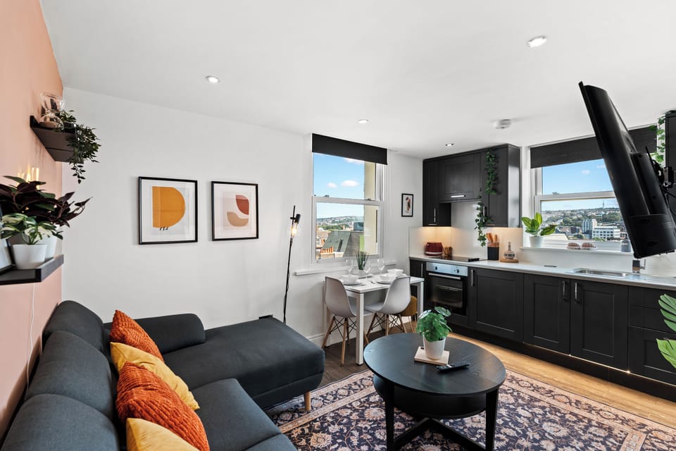 Modern, well-equipped kitchen with stunning city and sea views.