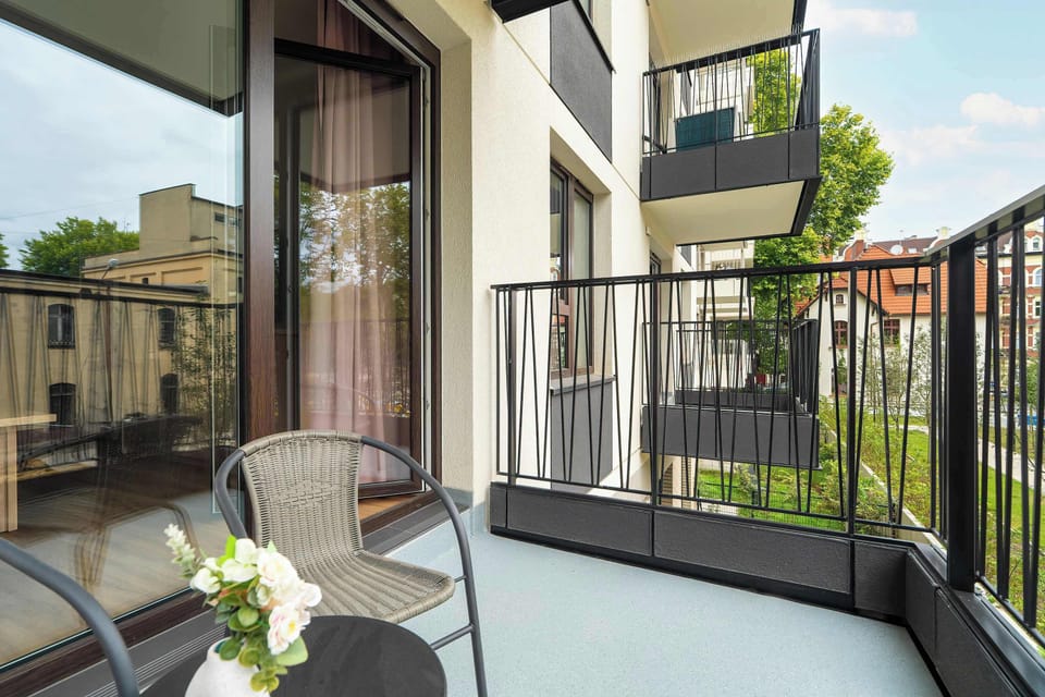 The balcony provides a perfect spot for enjoying the fresh air.