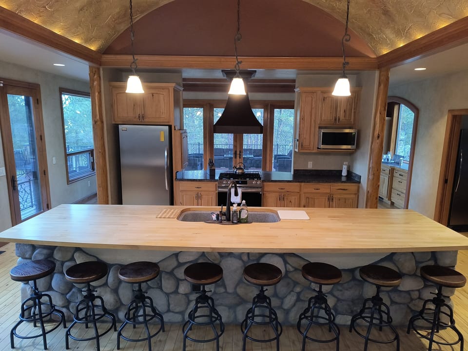 Lots of seating around the island! Everything you need to cook too.