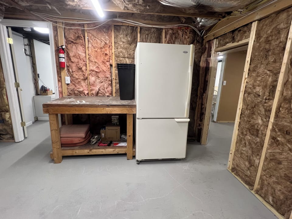 An extra refrigerator for added food and beverage storage