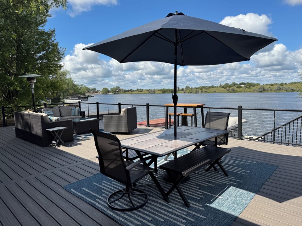 Large outdoor dining table with umbrella