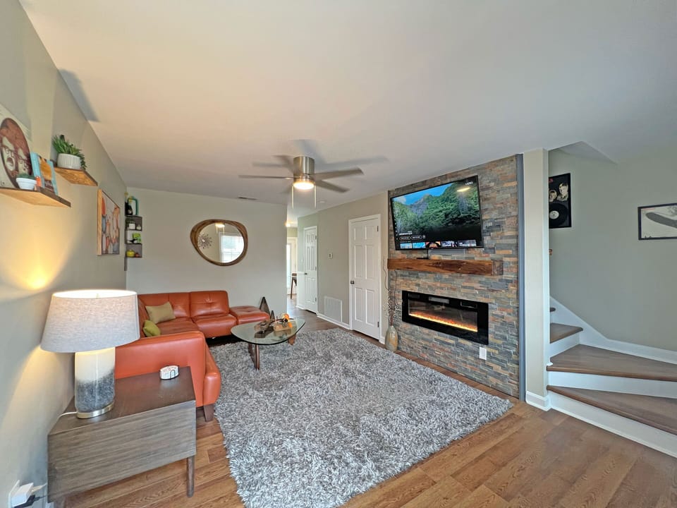 Living Room w/electric fireplace, smart TV, Alexa controlled smart home features