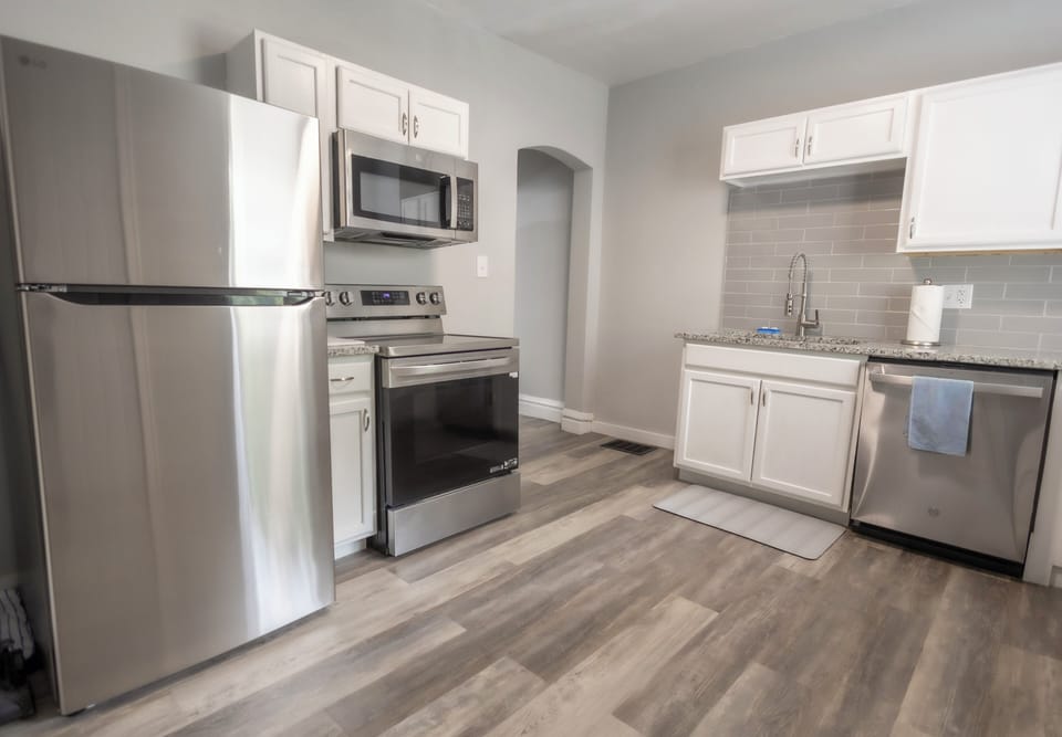 New appliances = fridge/freezer, stove/oven, dishwasher, microwave