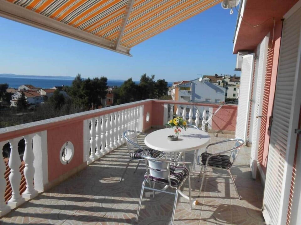Relax outside and enjoy the view of the lush Mediterranean garden filled with vibrant plants