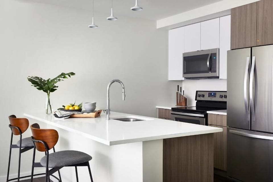 Cook and connect around the bright, modern kitchen island.
