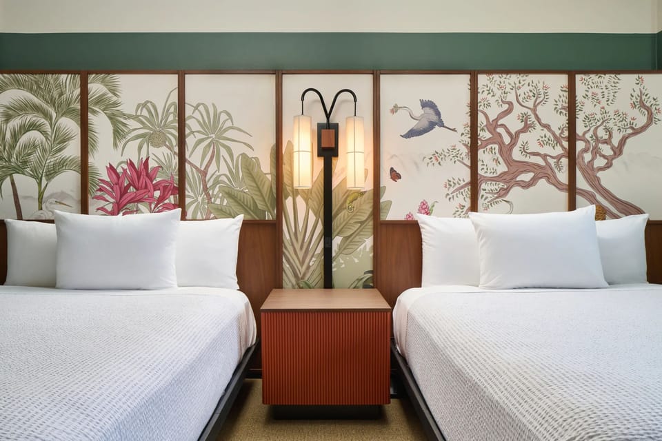 Drift off easily with plush linens and soothing bedside light.