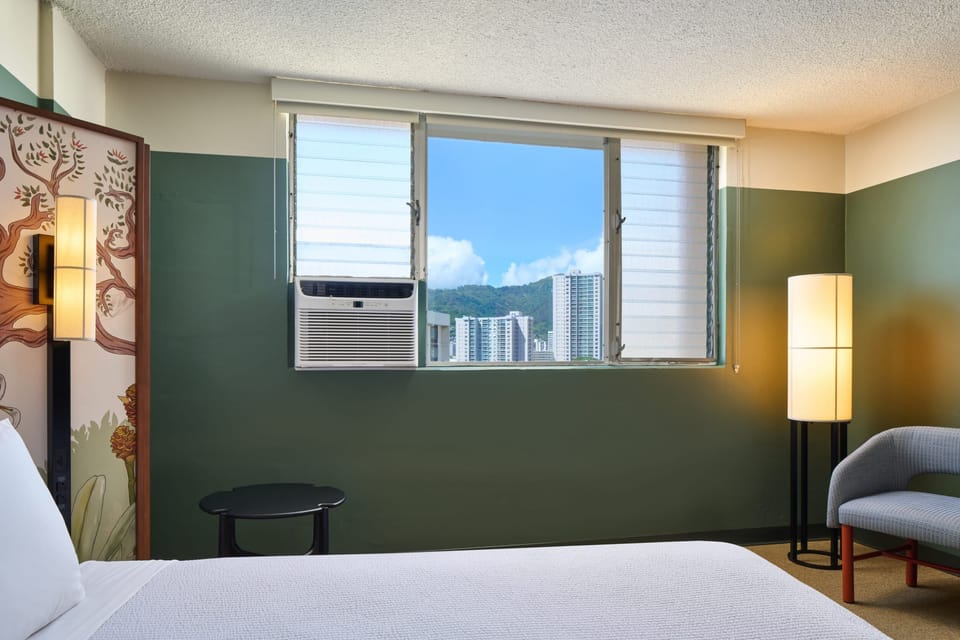 Wake up to sunshine and city views from your room.
