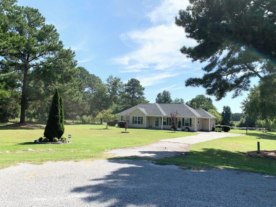 The house sits on 2 acres at the end of a quiet cul-de-sac. Views all around!