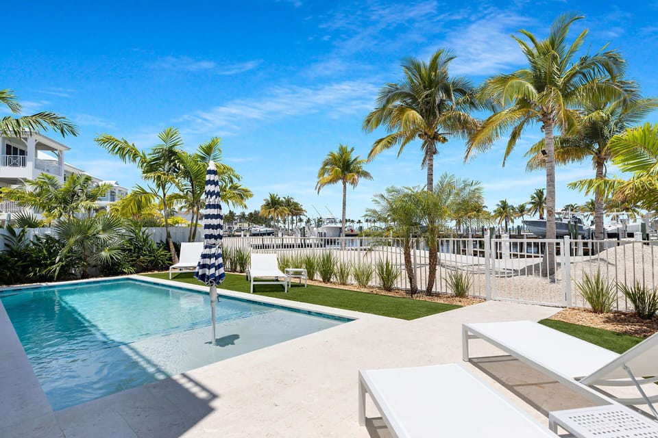 Waterfront, outdoor dining and multiple seating options, private pool