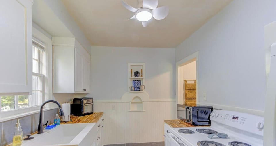 Cook your favorite meals with ease using the full stove, oven, and ample counter space.