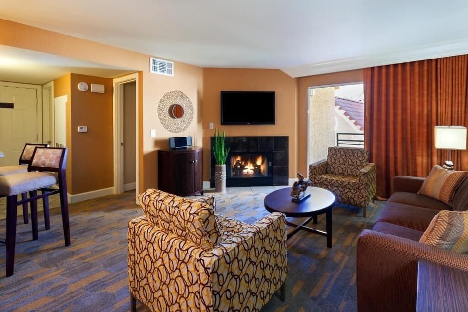 Gather by the glowing fireplace for cozy nights in.