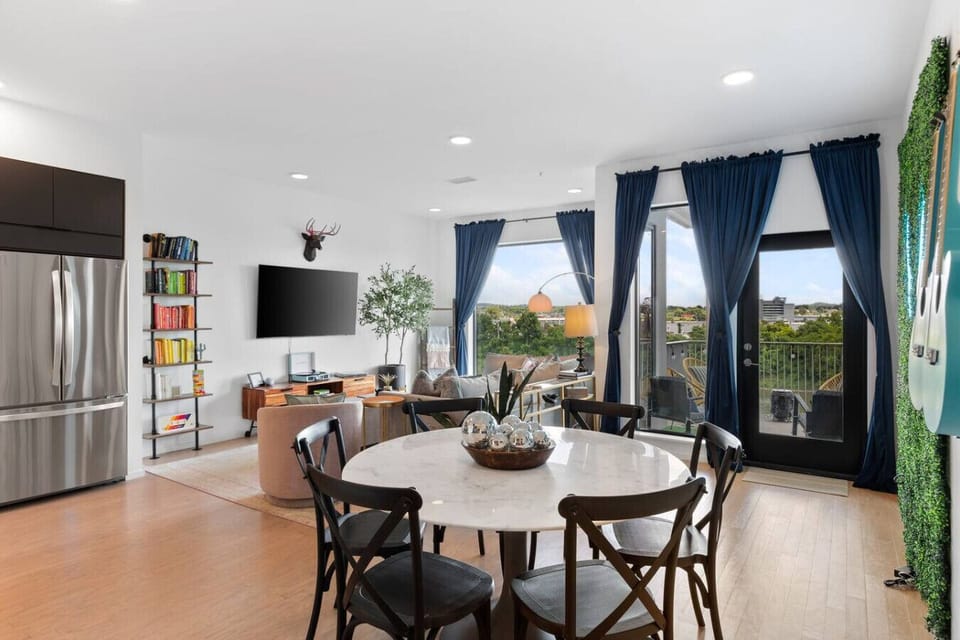 Fully equipped kitchen with high-end appliances, seating for 6 at our dining table.