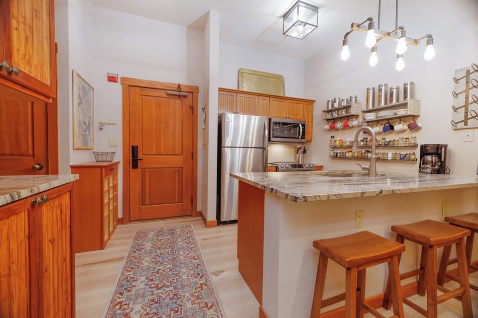 Quaint kitchen with all of the essentials