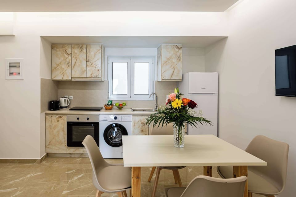 Dining Area with Natural Light – Comfortable setup with table and chairs.