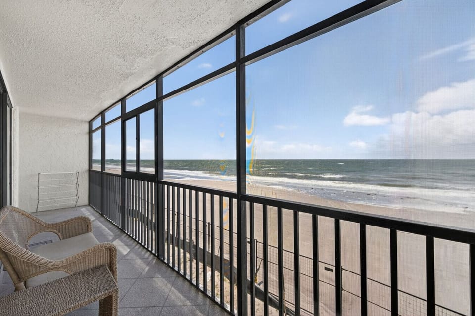 Sip morning coffee on the oceanview balcony, w/ railings framing endless blue water