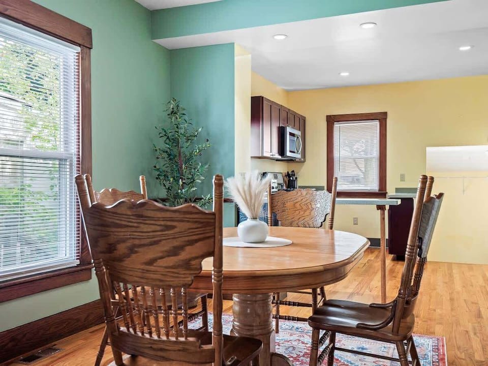 Bright dining room with natural light & cozy seating for family meals ️✨