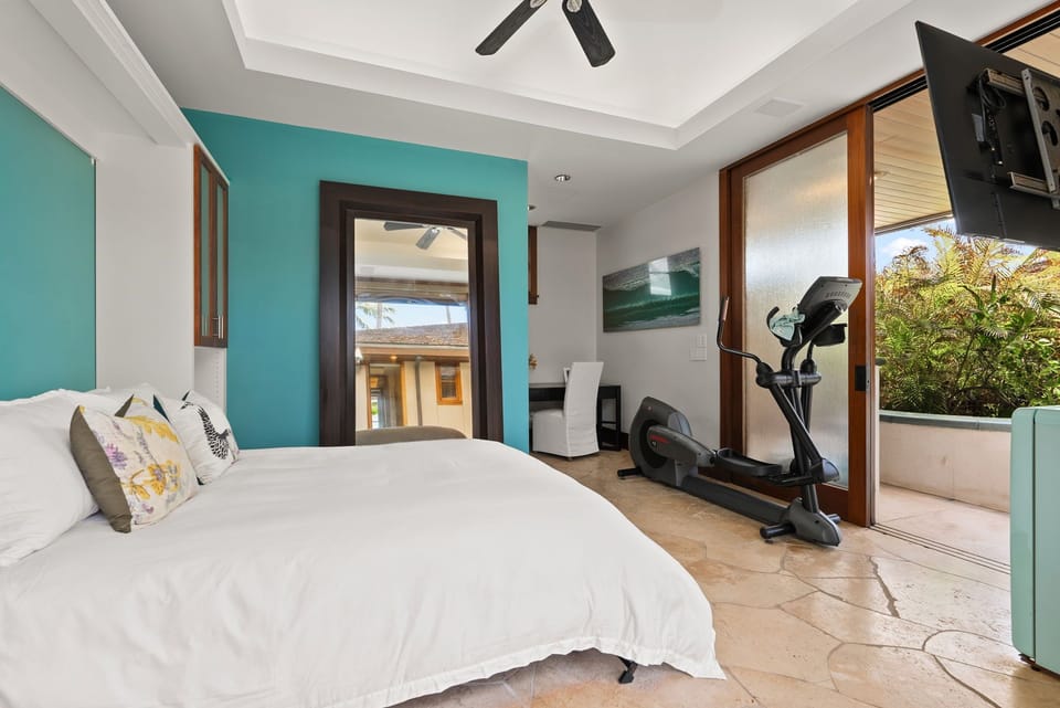 Pool house can be set up with a full murphy bed and exercise area.