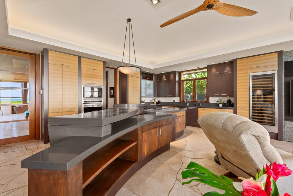 Chef’s kitchen with expansive counter space.