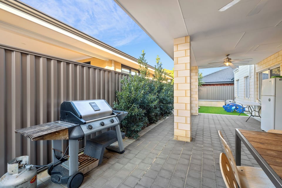 Fire up the grill for a barbecue feast and enjoy al fresco dining under the covered patio.