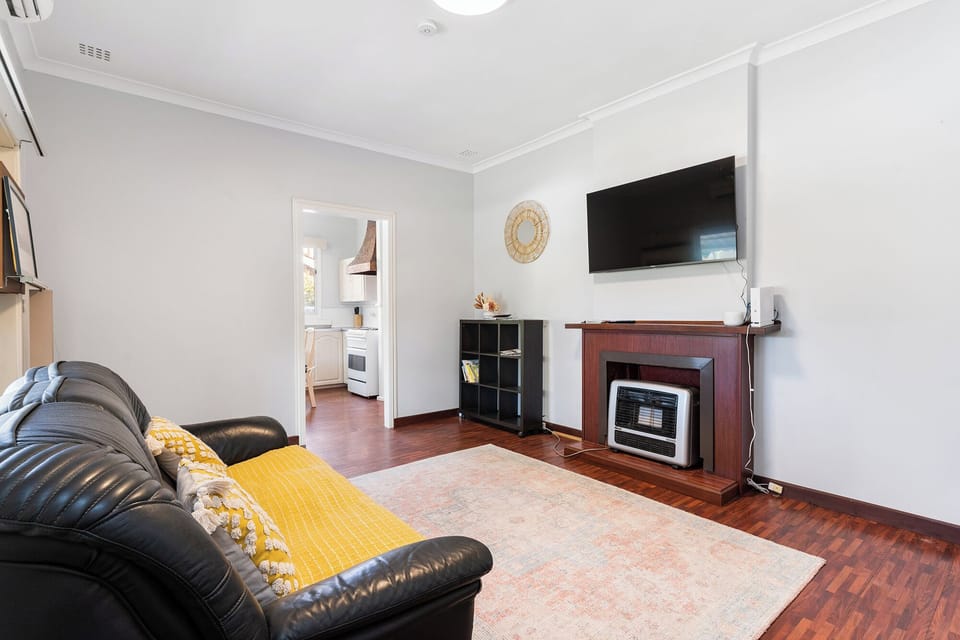 Relax in this bright and spacious living area, perfect for unwinding after a day of exploring Perth and the surrounding area.