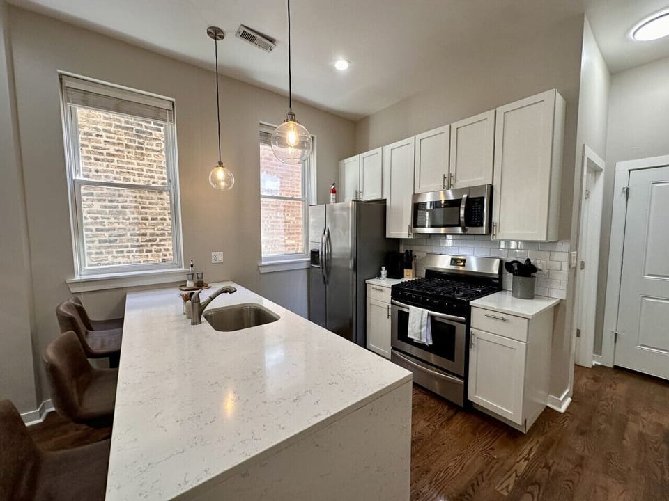 Full kitchen with bar stool seating