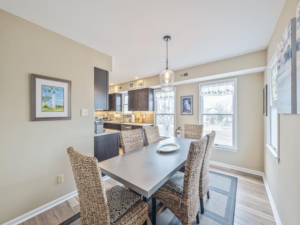 Elegant dining area with seating for six, perfect for shared meals and laughter.