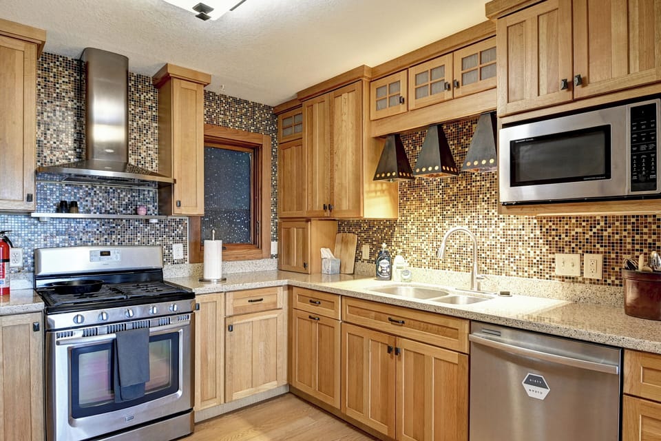 Full kitchen, stove, Microwave and Dishwasher, pots and pans and dishes include 