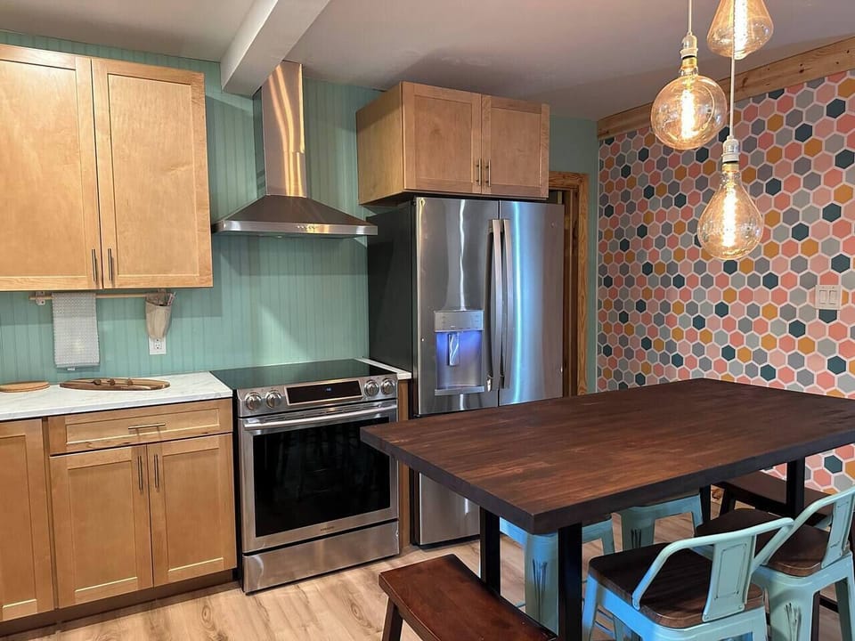 Kitchen is fun and well equipped. High end appliances