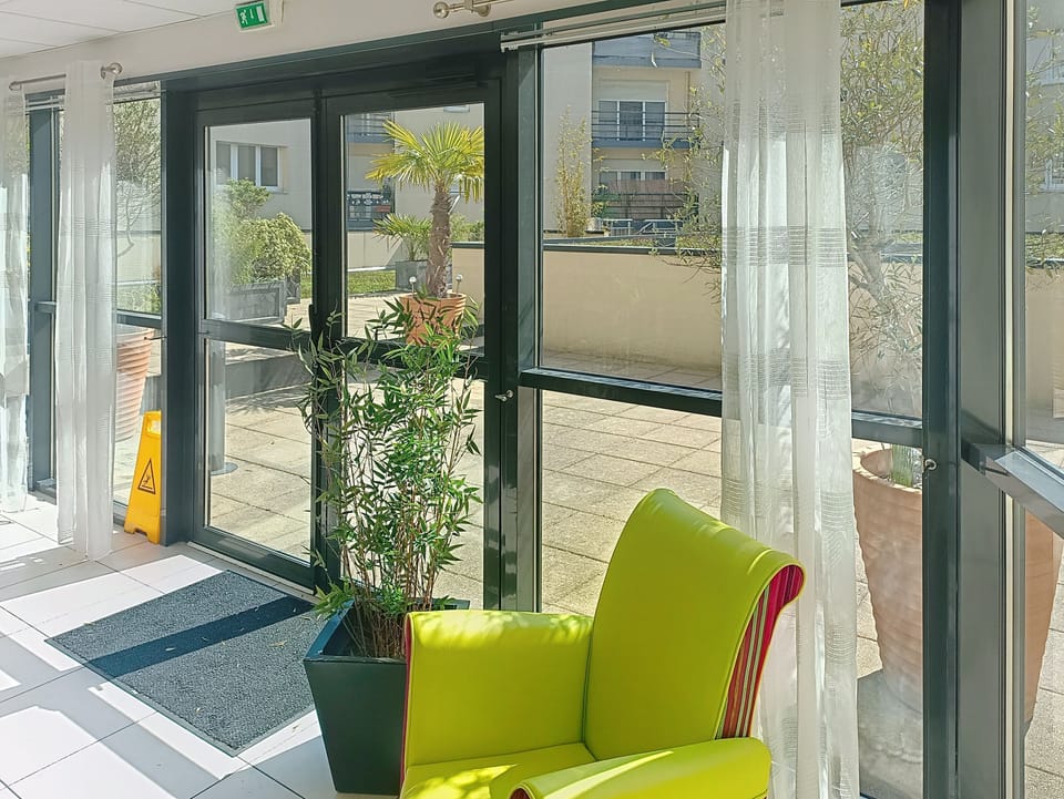 Reception lounge area providing a comfortable space for guests upon arrival.