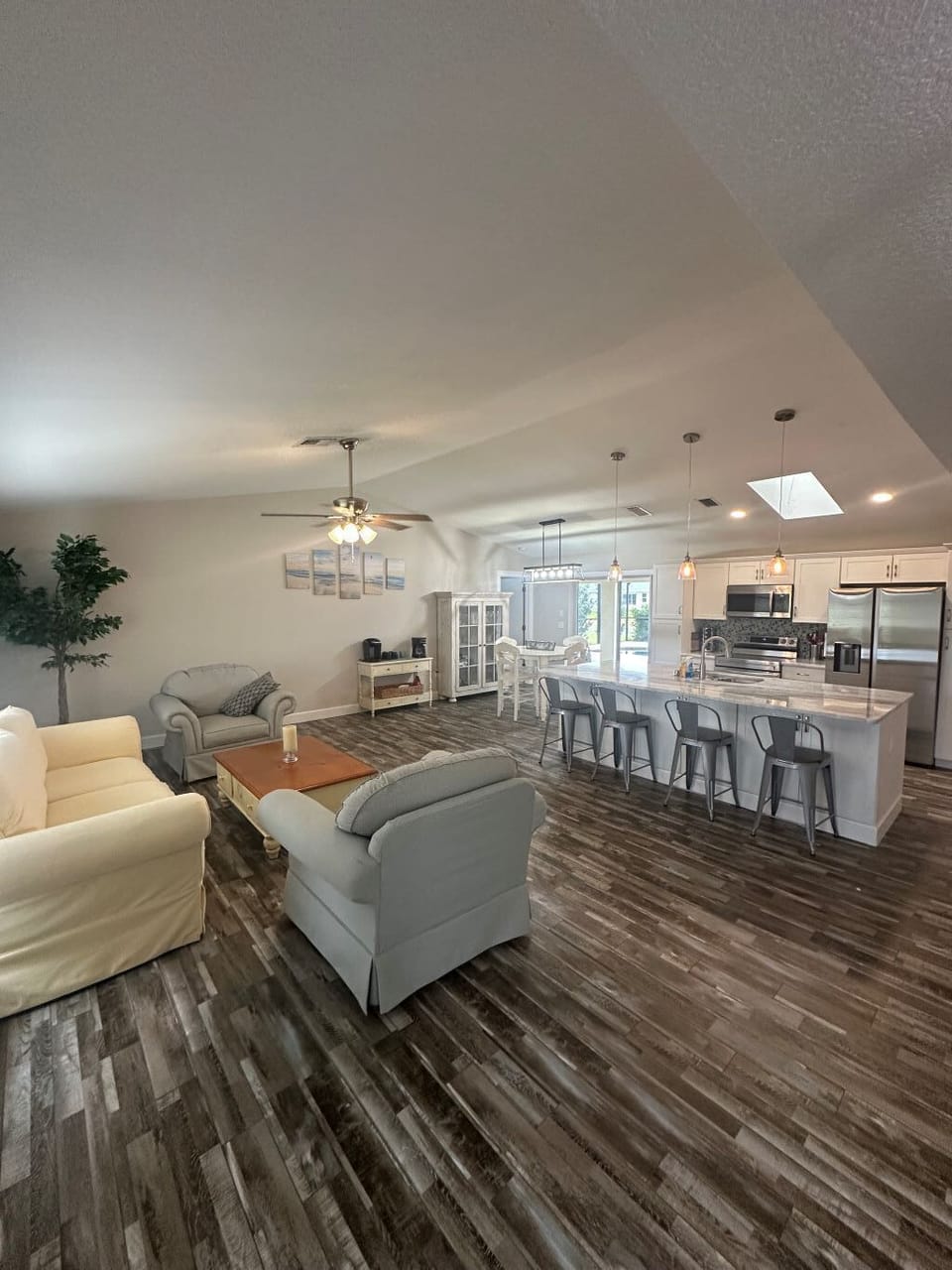 Open concept living room, kitchen, dining