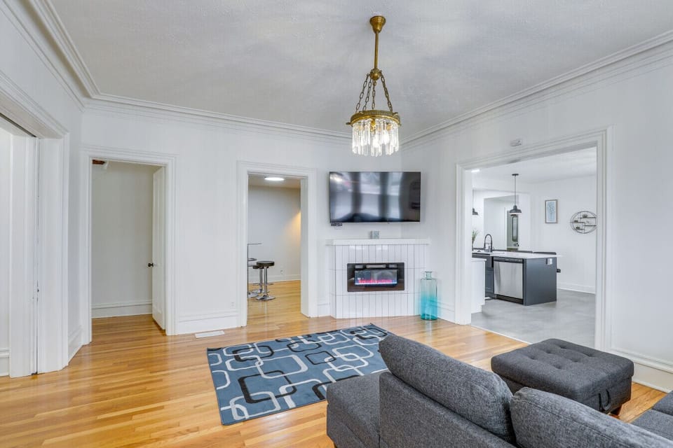 Kick back and relax in the bright, open living room with comfy seating and Smart TV.