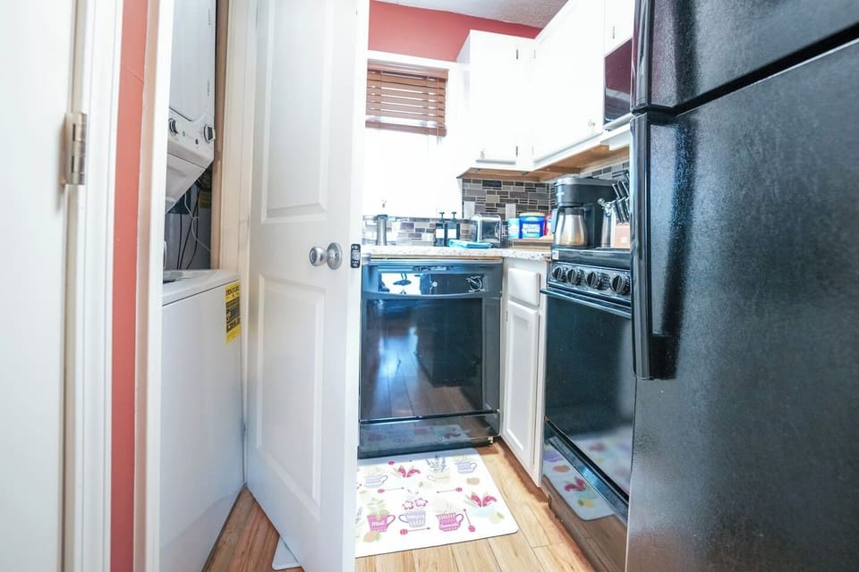 Stove/oven range, dishwasher, refrigerator, small appliances, drip coffee, Keurig, and washer/dryer.