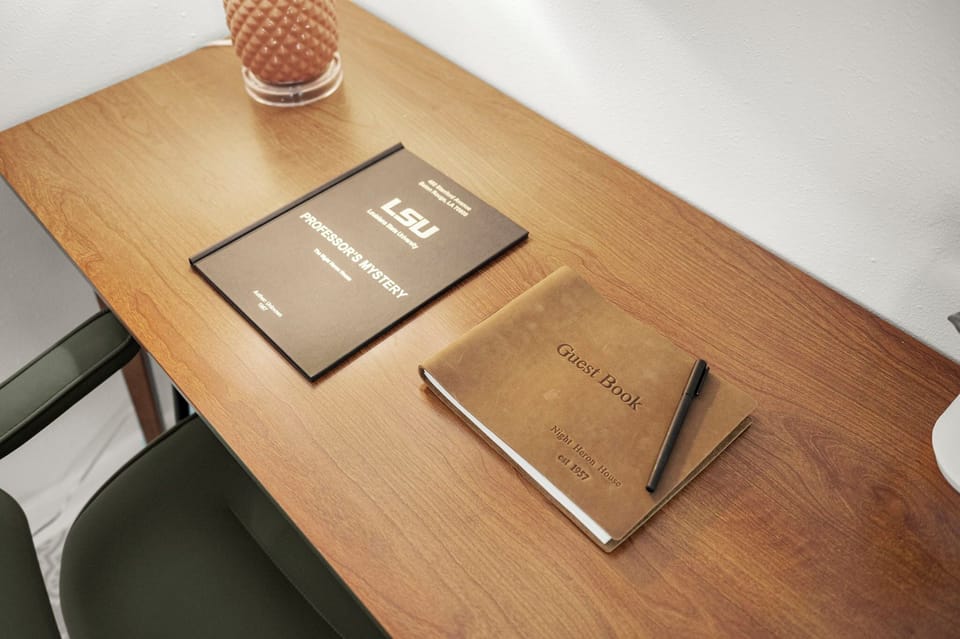 Workspace Retreat: Enjoy a stylish desk with a guest book to share your Baton Rouge stories!