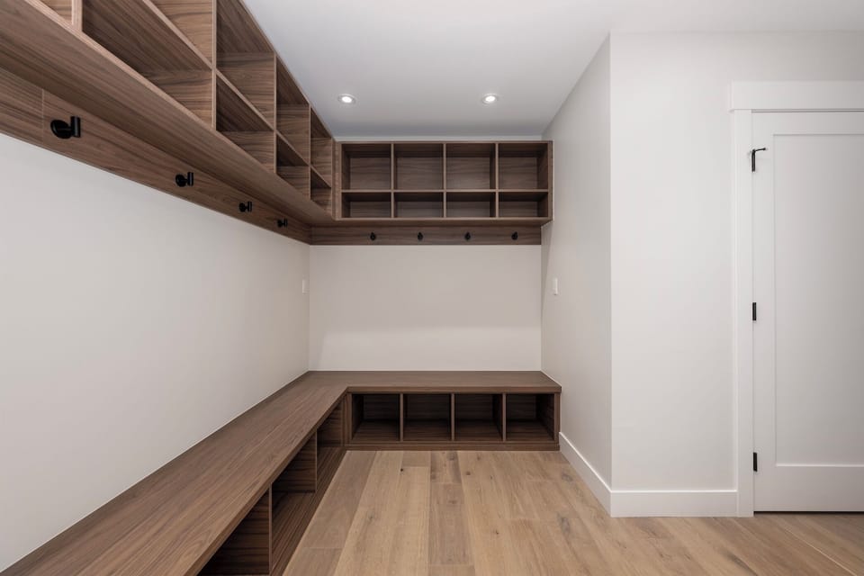Powder room on bottom level with garage and main entrance