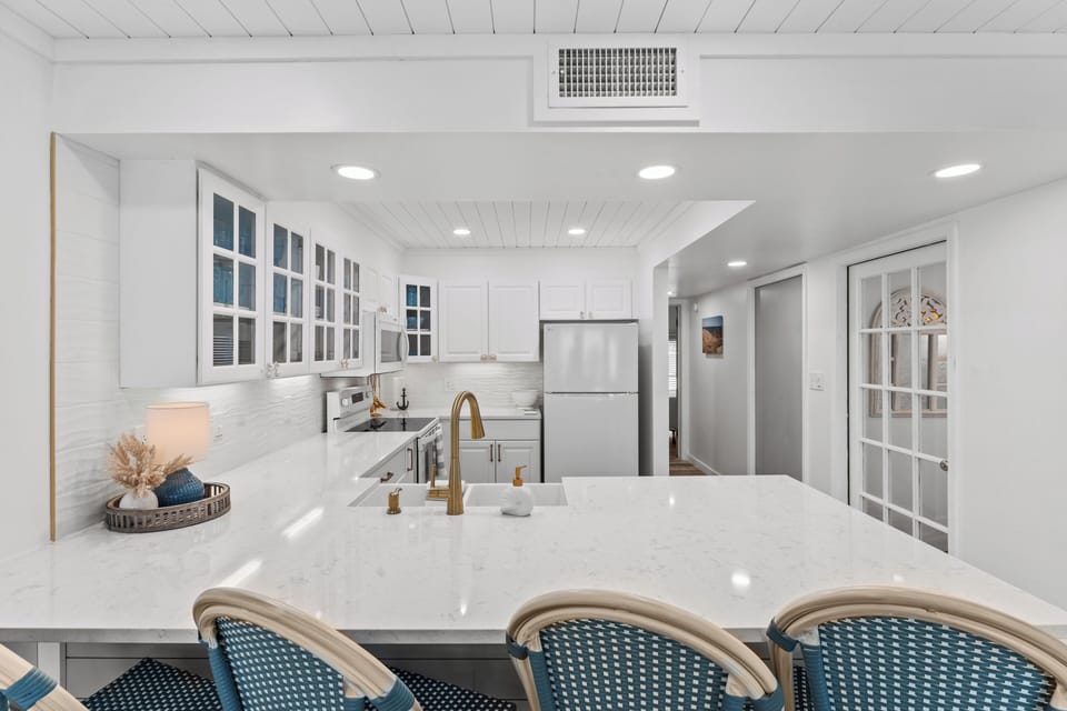 Stylishly updated kitchen with sleek, modern finishes.
