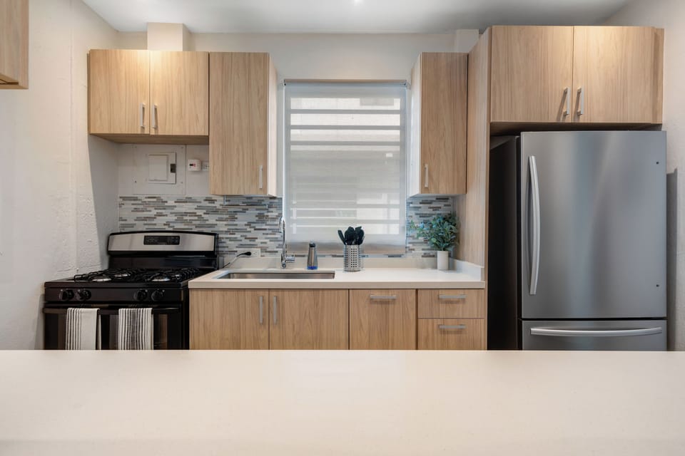 A well-equipped kitchen with brand-new appliances.