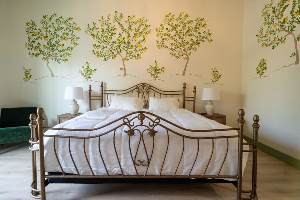 Thoughtfully designed king room with artisan touches and a warm, inviting feel