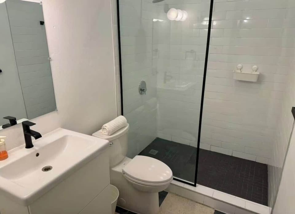 Start and end your day with a spacious glass-enclosed shower.