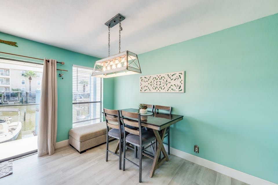 Enjoy waterfront dining at your stylish table, with soothing mint walls and canal views creating the perfect breakfast spot.
