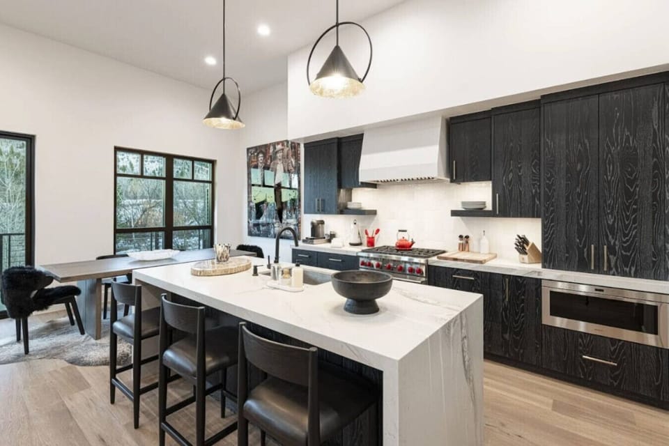 Gather, cook, and connect in a brightly designed space with inspiring views.