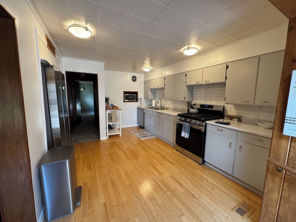 First Floor Kitchen 2 (Fully stocked, stove/oven, sink, full-size refrigerator)