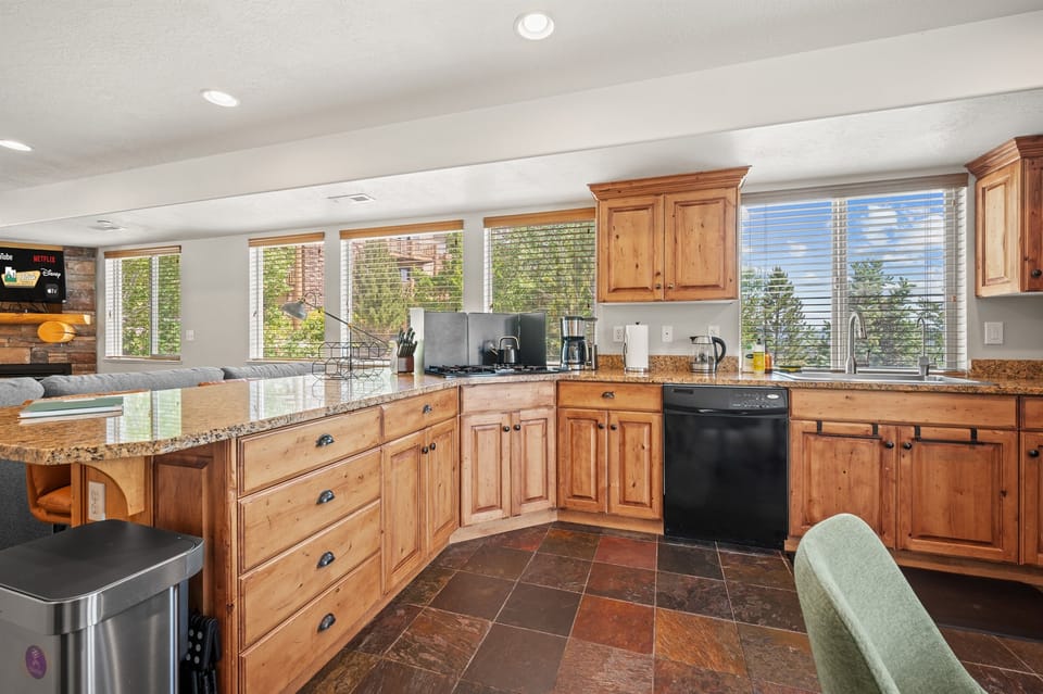 A panoramic view of the mountains to enjoy while preparing meals.