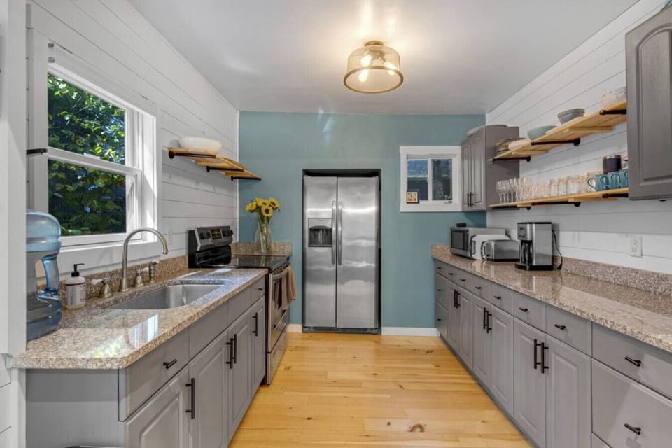 Spacious and well-equipped kitchen, perfect for family meals.