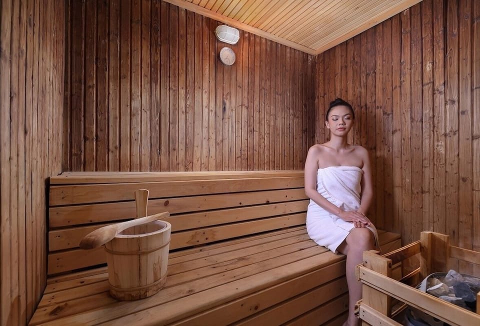 Shared sauna adds another on-site amenity beside the pools, spa, gym and tennis.