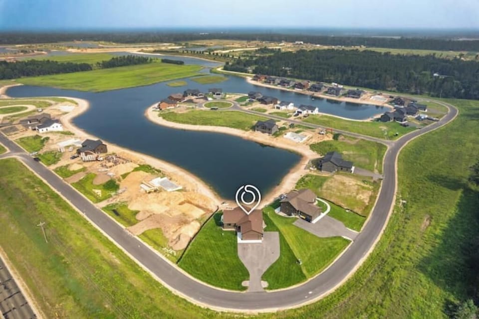 Overhead view: large driveway, sandy beach, lake access & outdoor fun