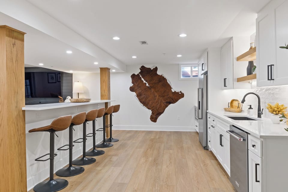 basement kitchenette and bar seating 