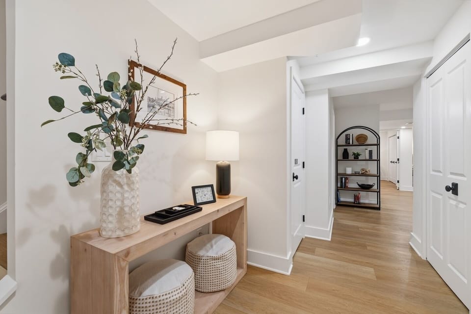 Welcome to the private basement suite — a comfortable retreat with bedroom, full bath, kitchenette, and living space