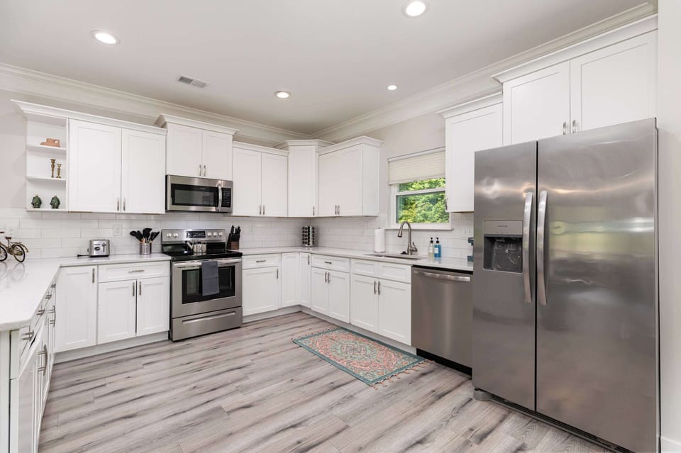 The kitchen is large and has lots of counter space, perfect for cooking a meal for the whole family! Our home is fully equipped with all of the tools necessary to prep a meal. 